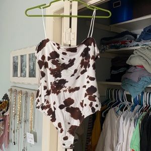 Cow print body suit!
